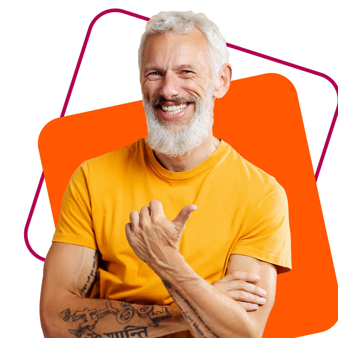 A volunteer with a white beard smiling in a cut out image against an orange background 