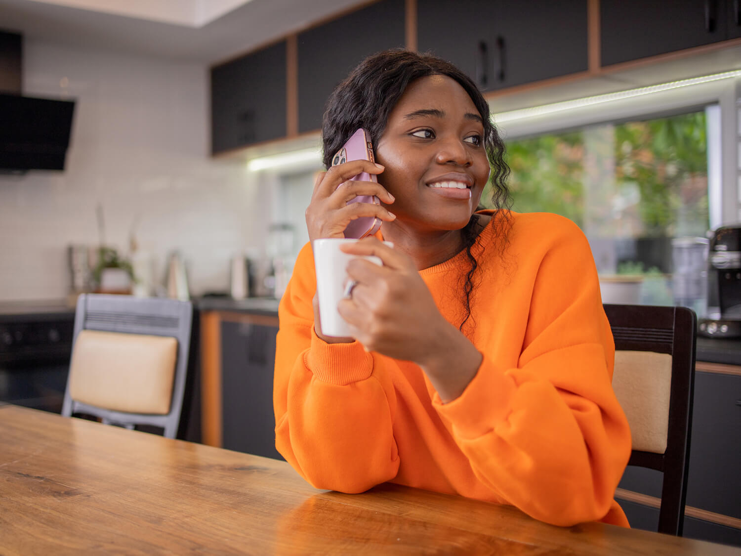 A younger volunteer providing telephone companionship 